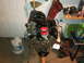 1990 Ford Bronco - Engine assembly sits on a stand in a garage, ready for installation or work.