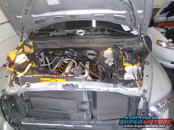 Engine bay of a 2002 Dodge 1500 with valve covers removed