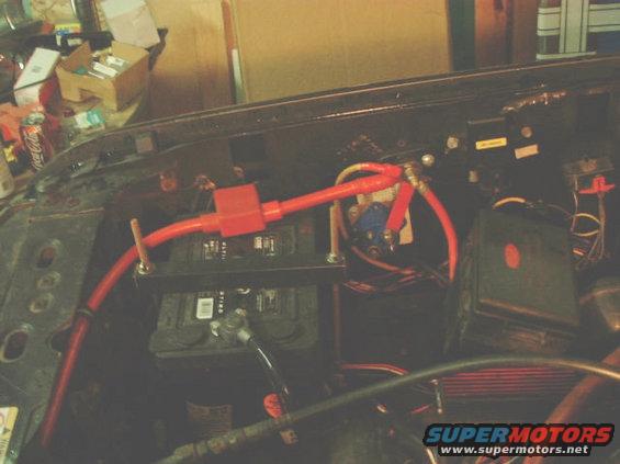 battery-1.1.jpg Battery 1 in Original position. Goes to distribution block with Red 2/0G, Yellow 4G feeds underhood fuse panel, Black 4G from ALT, Red 2G is for disconnect jumper cables on grill.