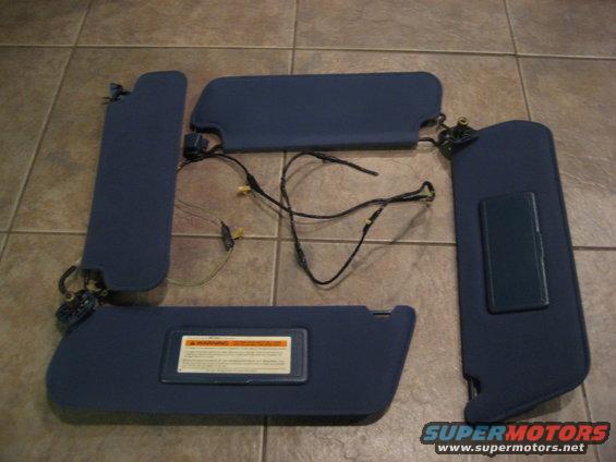 Four blue sun visors with wiring
