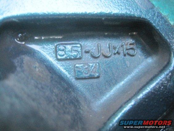 Close-up of a metal part with markings '8.5-JJx15' and 'F34'