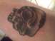 2003 Ford Crown Victoria - This is a tattoo of a skull on a person's skin.