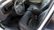 2001 Ford Crown Victoria - Interior view of a 2001 Ford Crown Victoria, highlighting the dashboard and seating.