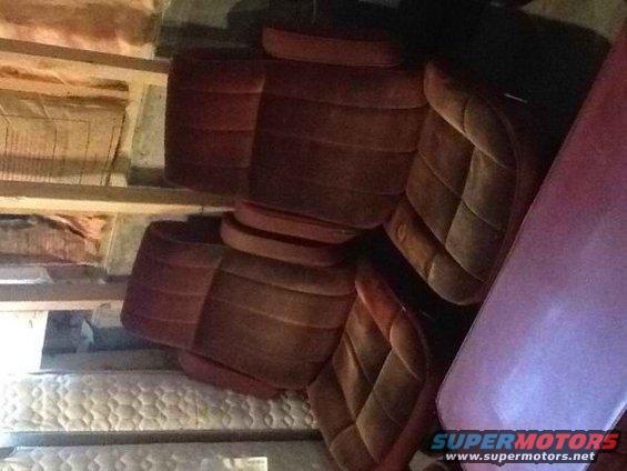 Stacked car seats with velour upholstery