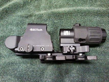 EOTech holographic sight with a magnifier attached to a rail mount