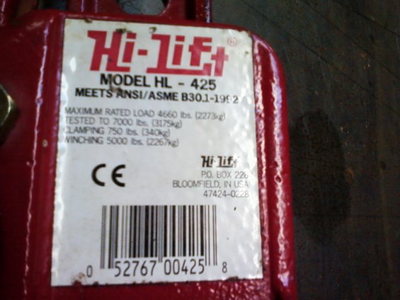 Red Hi-Lift HL-425 jack with label showing load ratings and barcode