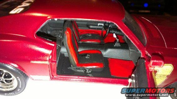 similar to what I want to do with the interior.  71 black and red buckets with 71 built in rubber floor mats.  Red headliner and A pillar. 