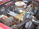 1956 Ford Thunderbird - Close-up view of a V8 engine bay, showing various components and wiring.