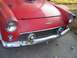 1956 Ford Thunderbird - Front view of a red 1956 Ford Thunderbird showing its distinctive grille and headlights.