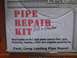 2003 Ford Crown Victoria - Packaging for a pipe repair kit, with handwritten note suggesting to call a plumber.