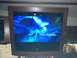 2003 Ford F-350 - Television screen displaying abstract blue imagery with text overlay.