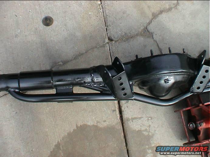 black rear axle assembly with custom brackets welded on