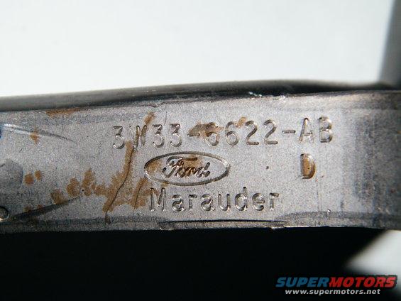 Metal part stamped with Ford logo and 'Marauder' text, part number 3W33-6622-AB