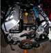 2004 Ford Crown Victoria - Engine assembly with V-shaped cylinder banks and exposed intake ports, likely a Ford modular engine.