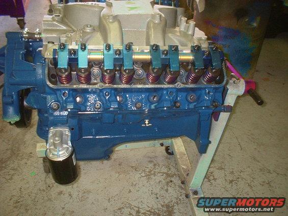 391 FT block @ 4.130;, new 3.98; Scat cast crank, new Scat 6.49; H-beams, Pro Gram Eng cross-bolted billet caps, Comp 294S soild lifter cam/lifters, Dove roller rocker arm assemblys, highly worked C8OE-N CJ heads, port matched E'bok 7105 intake manifold, M57HP oil pump /screen, ARP shaft, Ford windage tray, 2 in; deeper sump oil pan. 