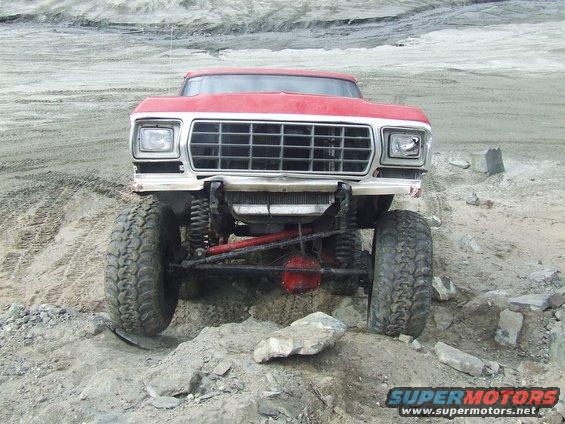 1978 Ford Bronco modified for off-road use, front view on rocky terrain