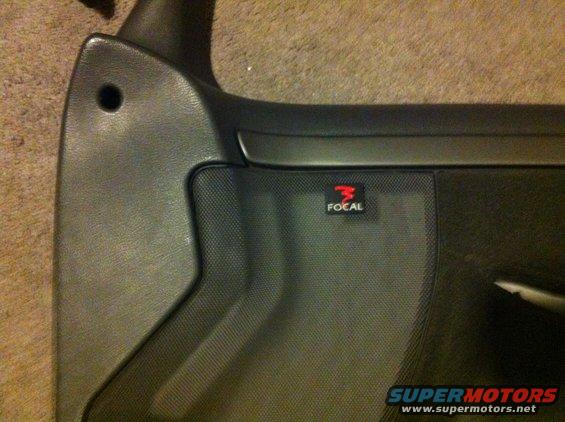 Took the emblems off the speaker grill's and installed them on the door panels.