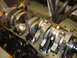1988 Ford Mustang - Close-up view of an engine's internal components, including the crankshaft and connecting rods.