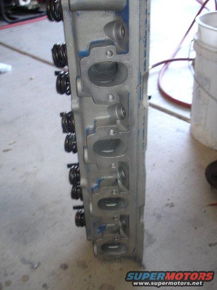 Engine cylinder head with valve springs visible