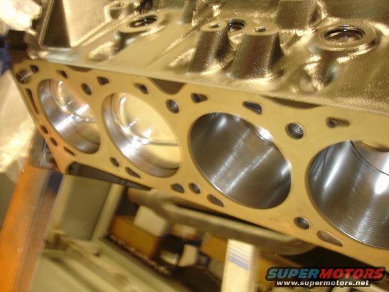 Close-up of engine block cylinders and gasket holes