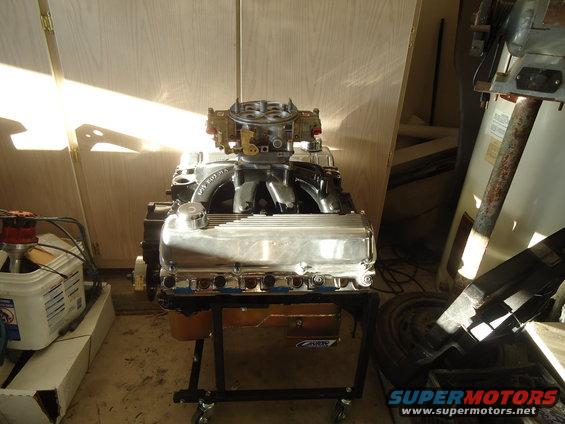 Engine on stand with carburetor and chrome valve covers