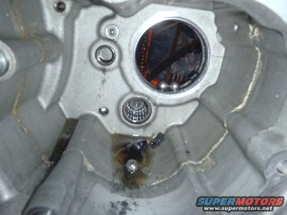 Motorcycle transmission interior with gears and bearings visible