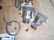 1996 Buell S1 Lightning w/Fairing - Transmission parts including gears and a bearing are laid out on cardboard.