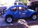 1970 Volkswagen Beetle - This modified 1970 Volkswagen Beetle features a Baja Bug conversion with off-road tires and a roll cage.