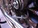 1970 Volkswagen Beetle - Custom exhaust system and engine details are visible in this close-up shot.