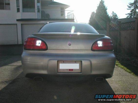 2002 Pontiac Grand Prix rear view with aftermarket clear reverse lights installed in taillights