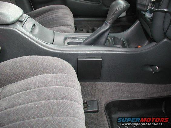 Interior center console cup holder and gear shifter