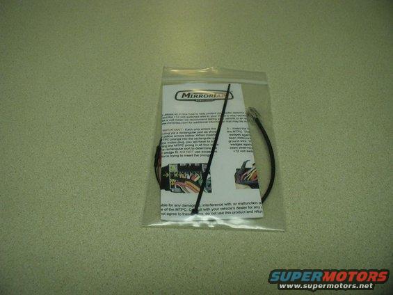 Radar detector wiring harness and instructions in a plastic bag