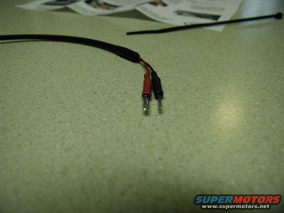 Red and black wires with metal connectors