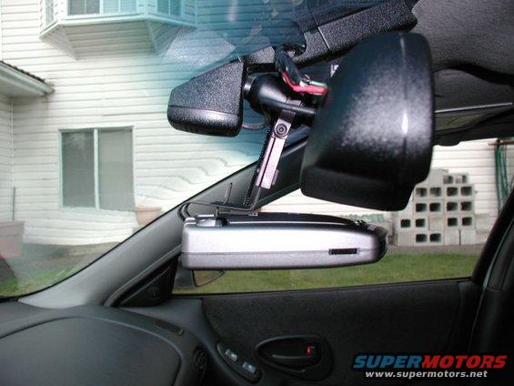 2002 Pontiac Grand Prix interior showing radar detector mounted near rearview mirror