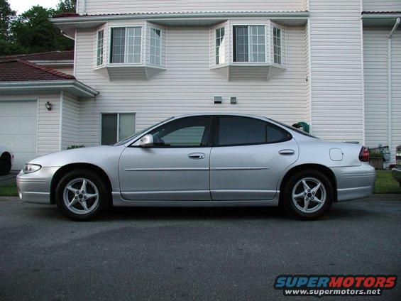 Silver 2002 Pontiac Grand Prix sedan, side view