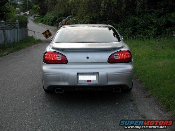 Silver 2002 Pontiac Grand Prix rear view with custom taillights