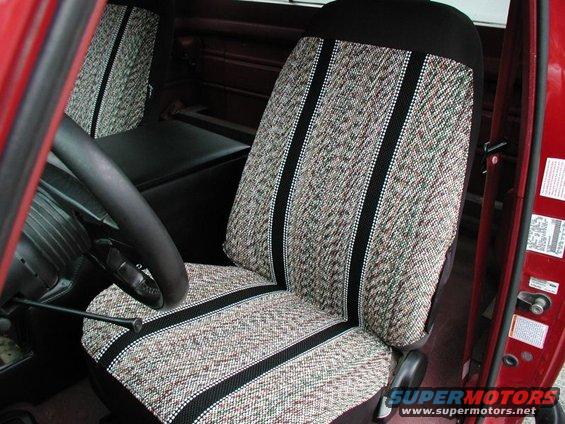 Interior of a 1990 Ford F-250 showing patterned seat and steering wheel