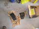 1997 Ford F-250 - Two black metal truck parts are shown, one unwrapped and one in its packaging, next to an open cardboard box with instructions.