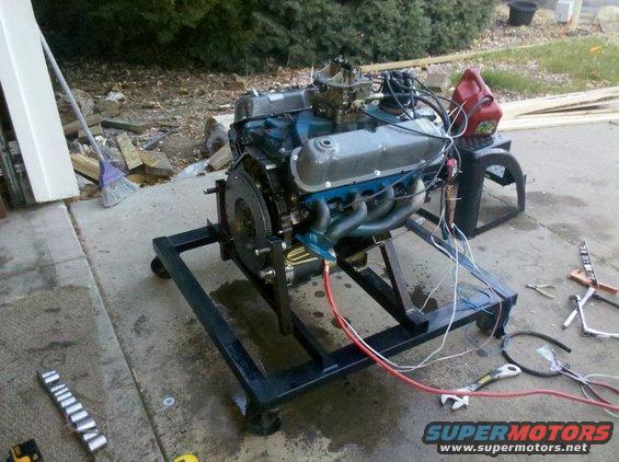 Engine on a stand with headers and carburetor