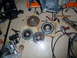 2007 Subaru Impreza - Clutch parts and tools are spread across the garage floor, ready for installation or repair.