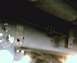 1984 Ford Bronco - Close-up view of a vehicle's undercarriage, a Supermotors.net watermark.
