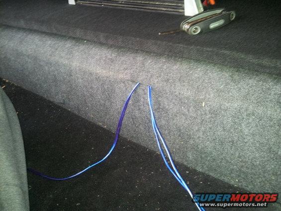 SPEAKER WIRE COMING FROM THE AMP