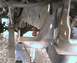 1984 Ford Bronco - Close-up view of a vehicle's undercarriage, focusing on suspension and frame components.