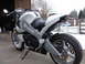 2003 Buell Lightning w/Fairing - A white Buell motorcycle is parked outdoors on a concrete surface with snow visible in the background.