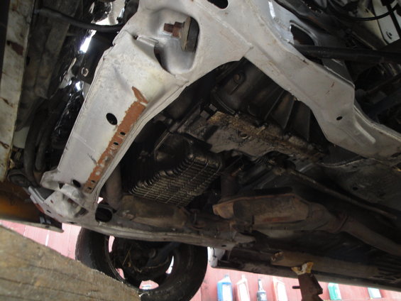 Underside view of vehicle transmission and exhaust system