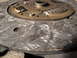 1992 Ford Taurus - Close-up of a worn clutch disc, showing the friction material and springs.