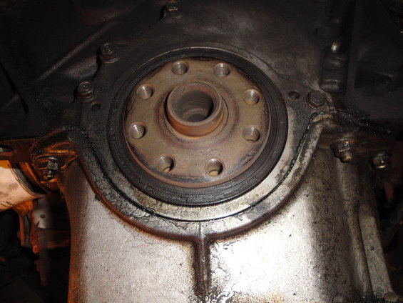 Close-up of a clutch assembly with a bolted flange and seal