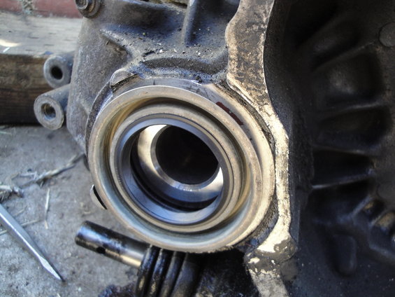 Close-up of clutch release bearing housing with metal seal
