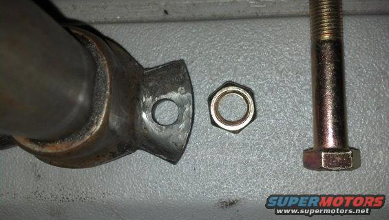 20130106_192207_610.jpg I didn't think the flange could be tapped to 3/8-24, and the nut screwed onto the bolt, since the hole is close to the "collar" on the shaft...I was wrong!