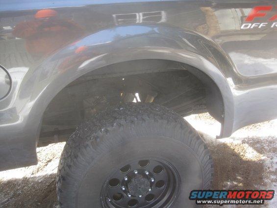 2003 Ford F-350 rear wheel well and tire